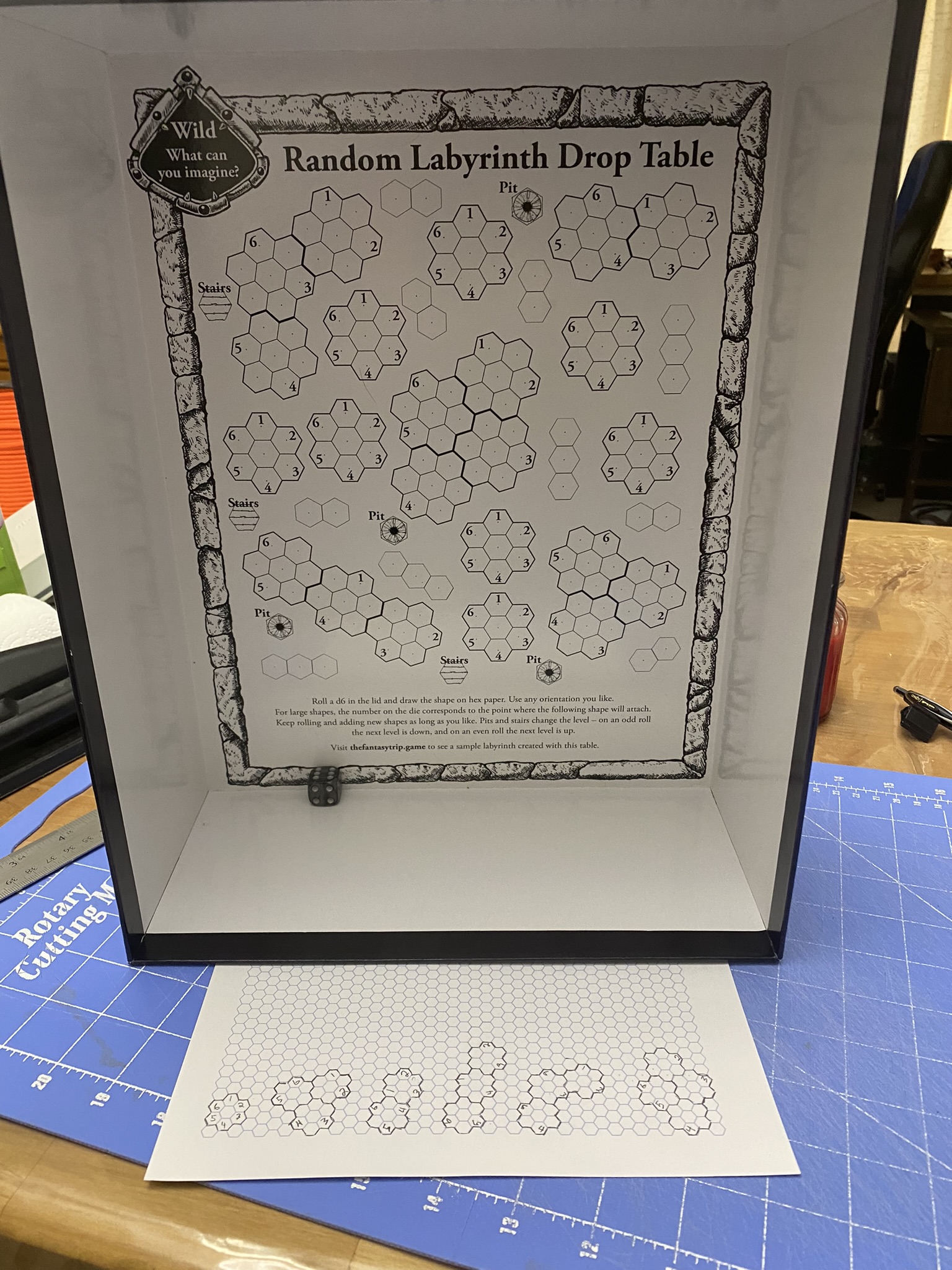 TFT box bottom and megahex shapes traced on hex paper to cut out